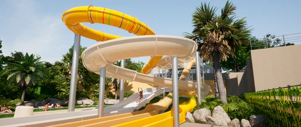 At Internacional de Calonge, a waterslide arches overhead with an individual gliding down, situated in a vibrant, tropical setting with sunbathers nearby.